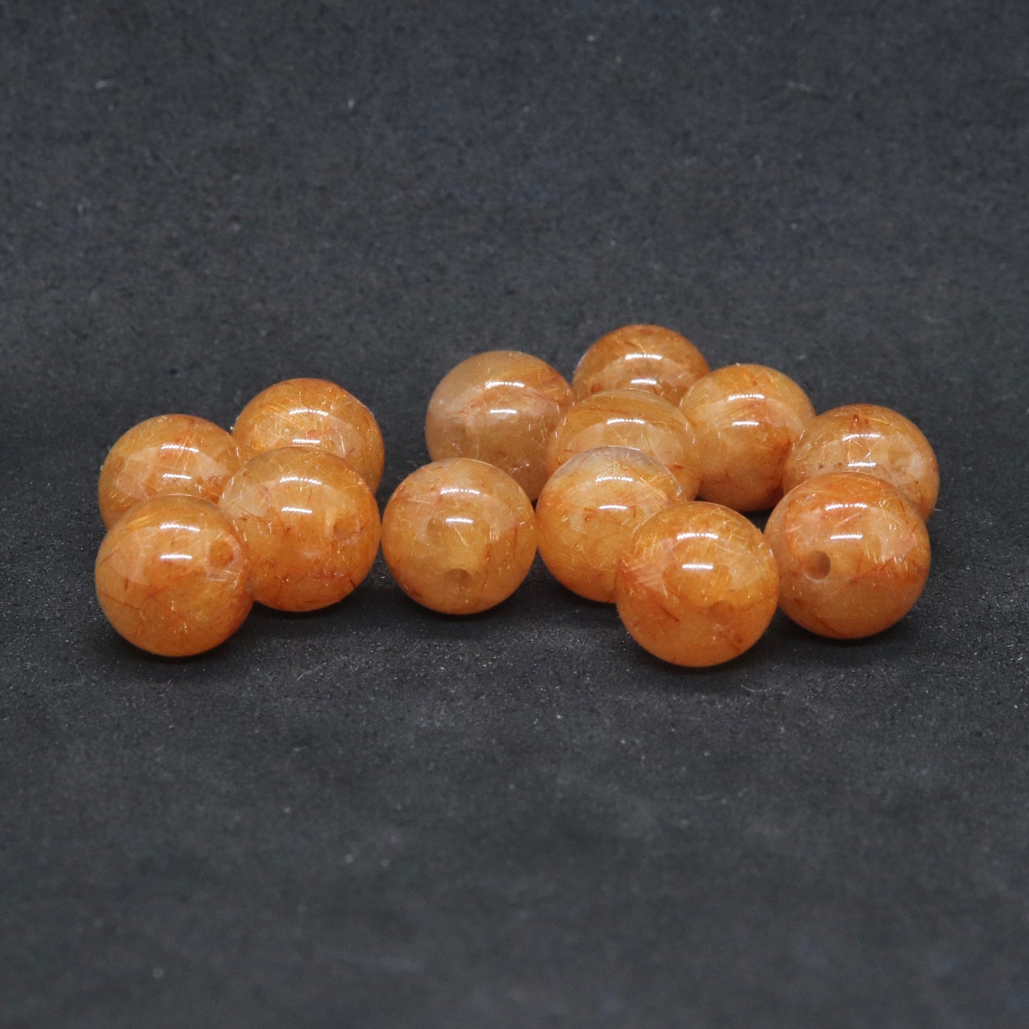 イエローオレンジルチルクォーツ7㎜一粒売り
