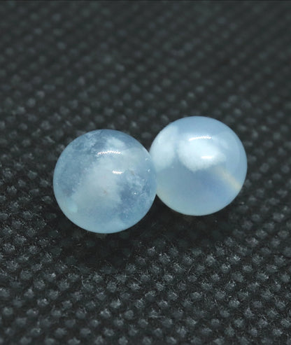 ホワイトスノーインアクアマリン8.5-9㎜一粒売り